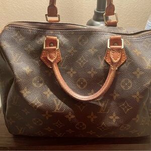 Louis Vuitton speedy handbag PLUS a FREE pair of GUCCI sunglasses.